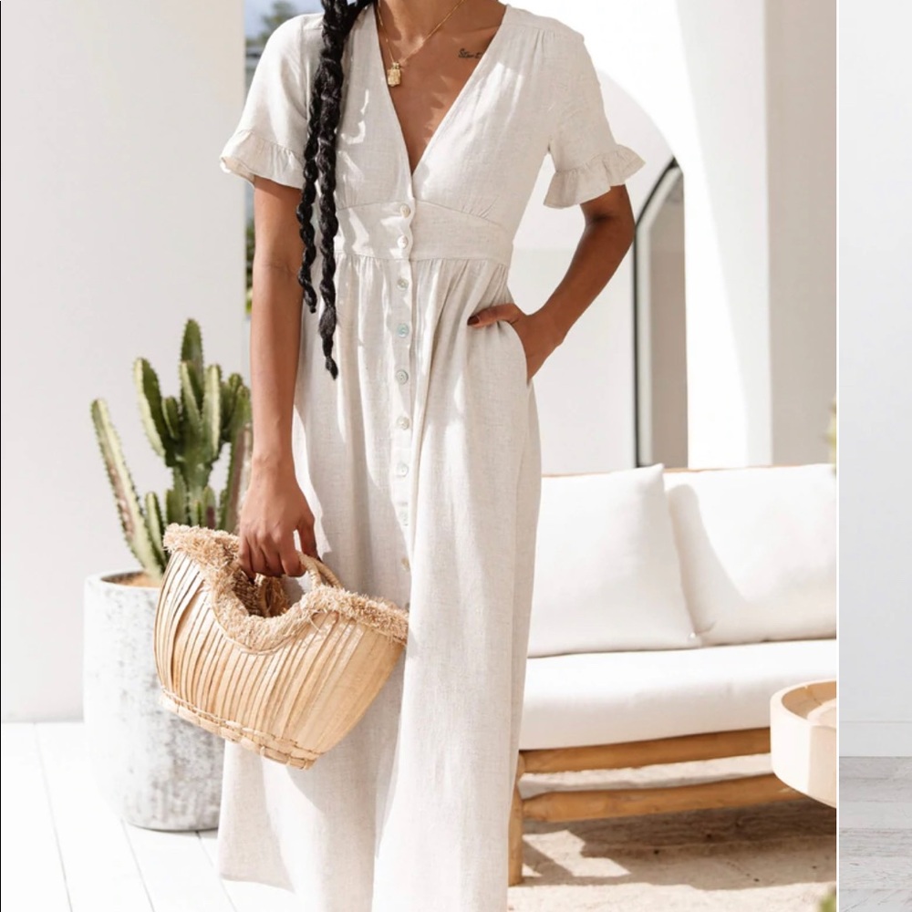 Linen dress. From Estherandco but is exactly like petal and pup miraloma dress.